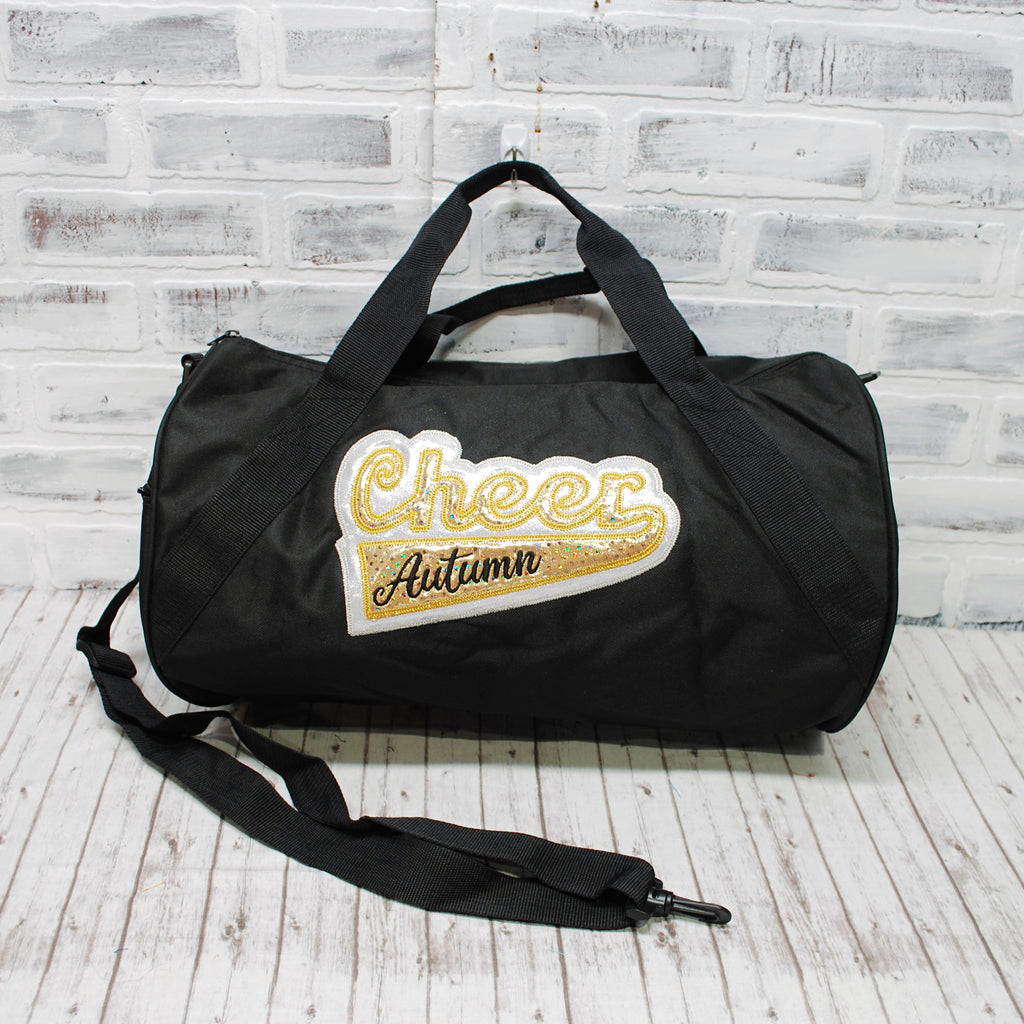 Gold and Silver Black Cheer duffle bag